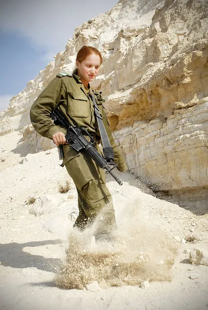 “Infantry Instructor at Field Training Week”, November 16, 2010. In celebration of the upcoming International Women's Day, we've decided to share with you photos of women serving across the range of different units in the IDF. On the ground, in the sea, or in the air; the IDF's women take equal part in protecting Israel at all times. Pictured: A cadet in the Infantry Instructor's Course during the Field Training Week, in which soldiers practice individual and group drills, navigation practice, sleeping in the field and camouflage training.