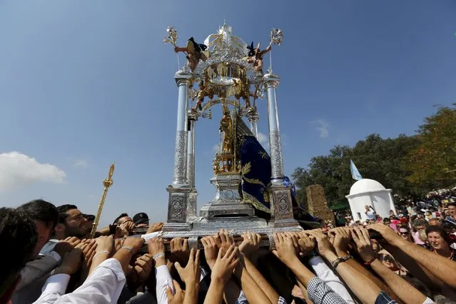 Pilgrims carry the Queen of Angeles during a procession in Alajar, southern Spain, September 8, 2015. (Photo by Marcelo del Pozo/Reuters)