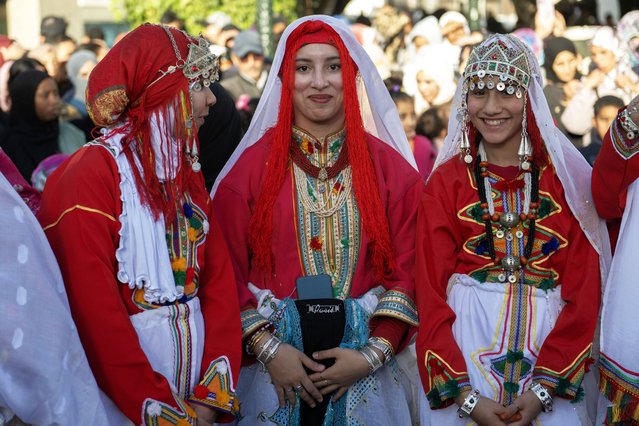 Berber women and girls wearing traditional clothes attend a celebration on the occasion of the celebration of the Amazigh New Year 2975, in Rabat, Morocco, 14 January 2025. Amazighs are an ethnic group belonging to the Berber tribes. (Photo by Jalal Morchidi/EPA)
