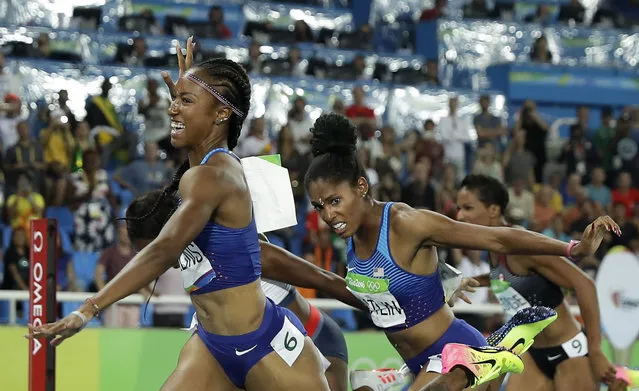 Brianna Rollins from the United States celebrates after winning the gold medal in the women's 100-meter hurdles final during the athletics competitions of the 2016 Summer Olympics at the Olympic stadium in Rio de Janeiro, Brazil, Wednesday, August 17, 2016. (Photo by Matt Slocum/AP Photo)