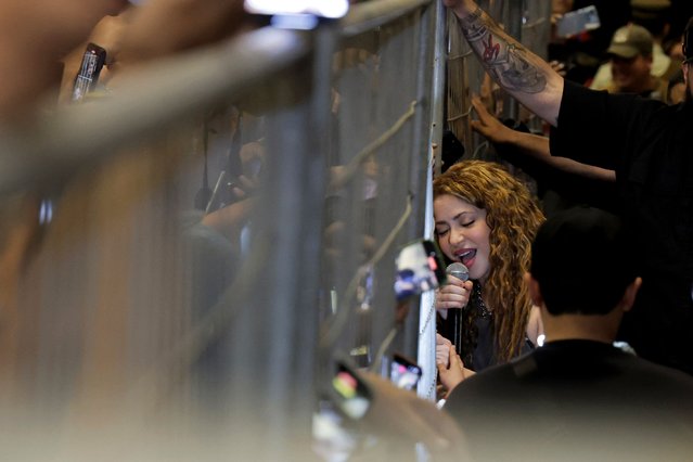 Colombian pop star Shakira sings to fans outside a hotel following the cancellation of two of her concerts in Santiago, Chile, Monday, March 3, 2025. (Photo by Javier Torres/AP Photo)