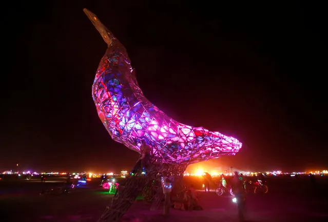 The Space Whale is lit as the Man burns as approximately 70,000 people from all over the world gather for the 30th annual Burning Man arts and music festival in the Black Rock Desert of Nevada, U.S. September 3, 2016. (Photo by Jim Urquhart/Reuters)