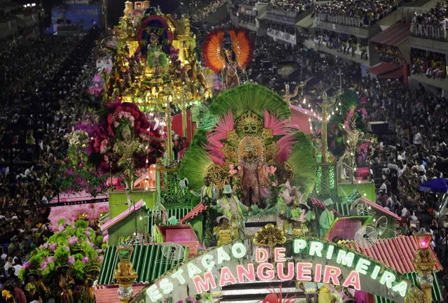 Revellers from the Mangueira samba school participate during the annual carnival parade in Rio de Janeiro's Sambadrome, February 11, 2013. (Photo by Ricardo Moraes/Reuters)