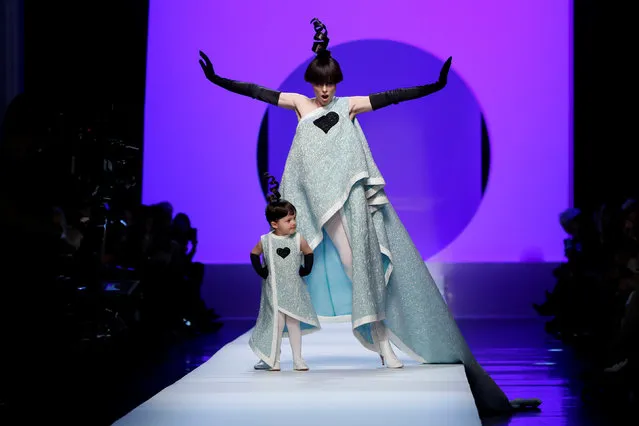 Model Coco Rocha and her daughter present creations by French designer Jean Paul Gaultier as part of his Haute Couture Spring-Summer 2018 fashion collection in Paris, France on January 24, 2018. (Photo by Gonzalo Fuentes/Reuters)