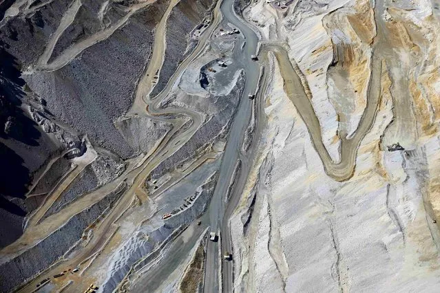 An aerial view of roads as mining trucks travel along at CODELCO'S Andina copper mine at Los Andes Mountain range, near Santiago city, November 17, 2014. (Photo by Ivan Alvarado/Reuters)