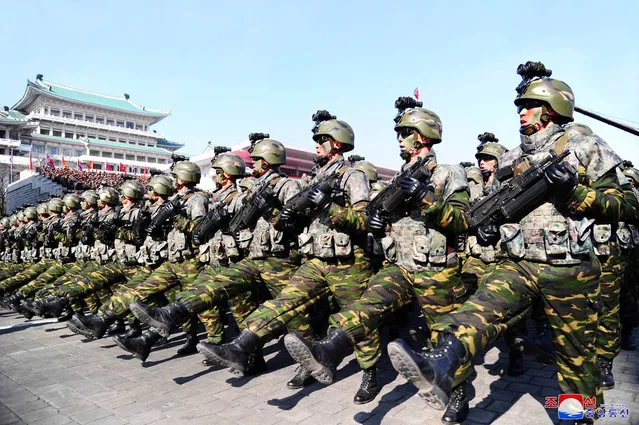 Soldiers march during a grand military parade celebrating the 70th founding anniversary of the Korean People's Army at the Kim Il Sung Square in Pyongyang, in this photo released by North Korea's Korean Central News Agency (KCNA) February 9, 2018. (Photo by Reuters/KCNA)