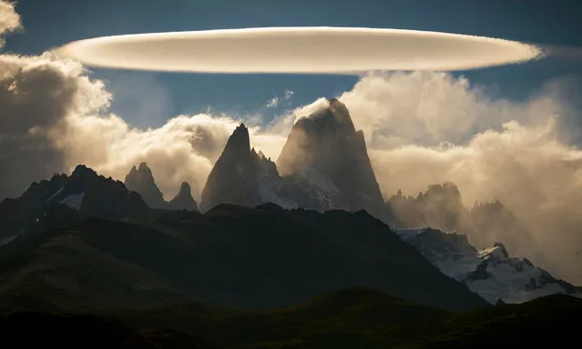 “El Chaltén”. A rare flying saucer-shaped cloud known as a lenticular appears over a rock formation in Argentina. (Photo by Francisco Javier Negroni Rodriguez/Royal Meteorological Society’s Weather Photographer of the Year Awards)
