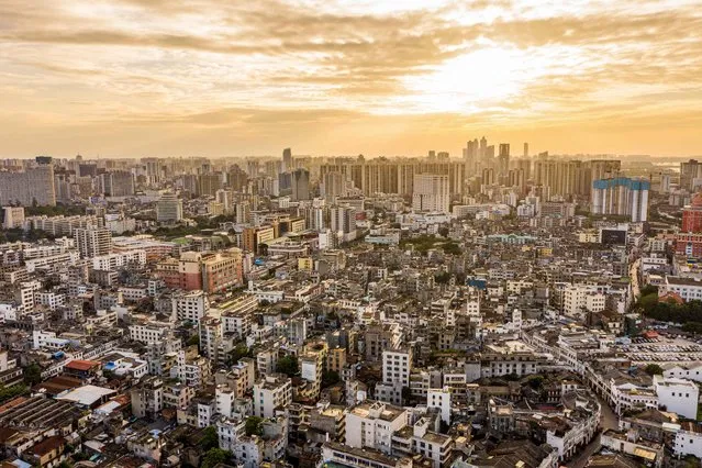 This photo taken on March 2, 2023 shows an aerial view of residental buildings in Haikou, in China's southern Hainan province. (Photo by AFP Photo/China Stringer Network)