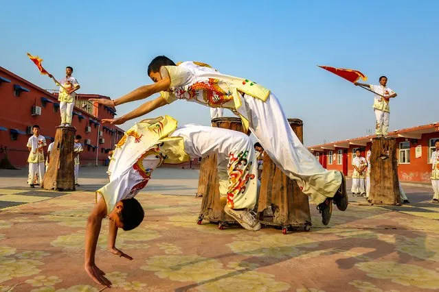Students attend a rehearsal of a Meihua Quan (aka Meihuaquan) performance, a kind of Chinese kung fu, for the upcoming Chinese new year in Jize County on January 15, 2022 in Handan, Hebei Province of China. (Photo by Jin Hua/VCG via Getty Images)