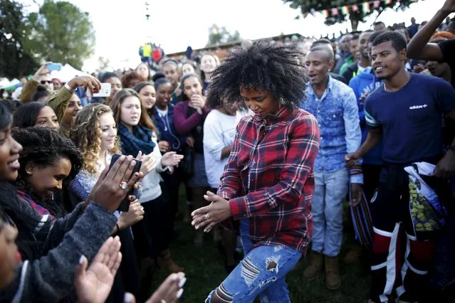 Members of the Ethiopian Jewish community in Israel dance during a ceremony marking the holiday of Sigd in Jerusalem November 11, 2015. Sigd marks the community's longing to return to Jerusalem, where they see their biblical roots. (Photo by Amir Cohen/Reuters)