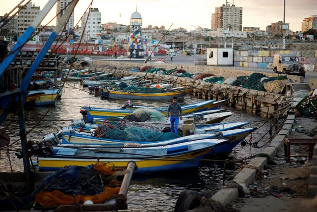 A Palestinian fisherman stands in a boat at the seaport of Gaza City September 26, 2016. (Photo by Mohammed Salem/Reuters)