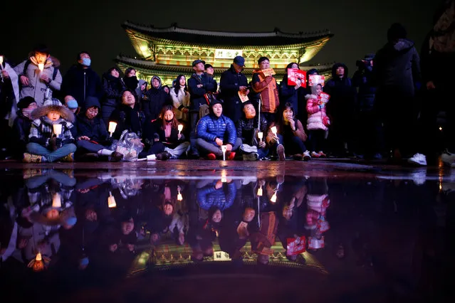 People attend a protest calling for Park Geun-hye to step down in central Seoul, South Korea, November 26, 2016. (Photo by Kim Kyung-Hoon/Reuters)