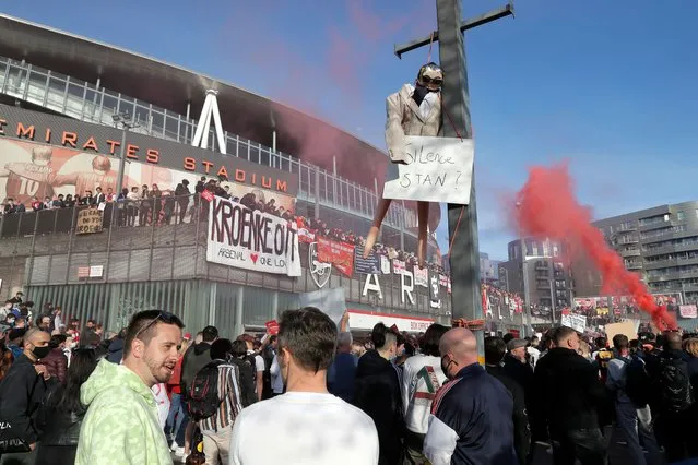 Arsenal fans hang and effigy of Owner Stan Kroenke during a protest outside the stadium prior to the Premier League match between Arsenal and Everton at Emirates Stadium on April 23, 2021 in London, England. Sporting stadiums around the UK remain under strict restrictions due to the Coronavirus Pandemic as Government social distancing laws prohibit fans inside venues resulting in games being played behind closed doors. (Photo by Guardian News & Media)