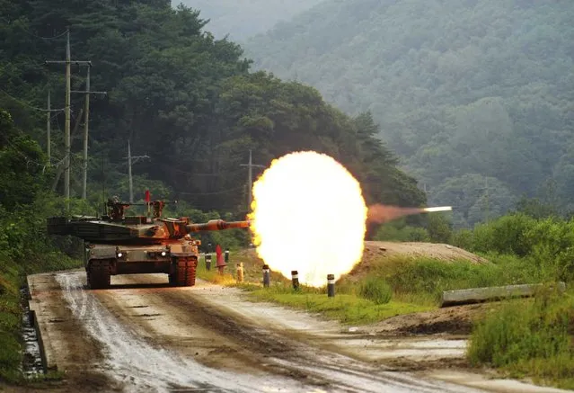 In this photo provided by South Korea Defense Ministry, a South Korean army's K1A2 tank fires during a drill as part of South Korea and the United States' joint annual military exercise, the Ulchi Freedom Shield, at a training filed in Cheorwon, South Korea, Wednesday, August 30, 2023. (Photo by South Korea Defense Ministry via AP Photo)