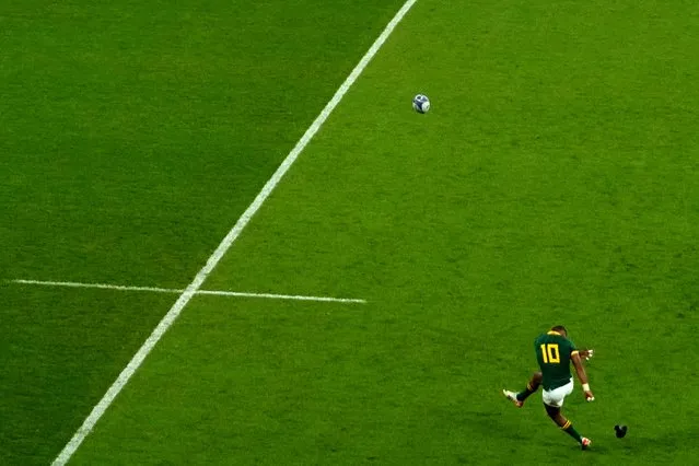 South Africa's Manie Libbok kicks a conversion during the Rugby World Cup quarterfinal match between France and South Africa at the Stade de France in Saint-Denis, near Paris Sunday, October 15, 2023. (Photo by Themba Hadebe/AP Photo)