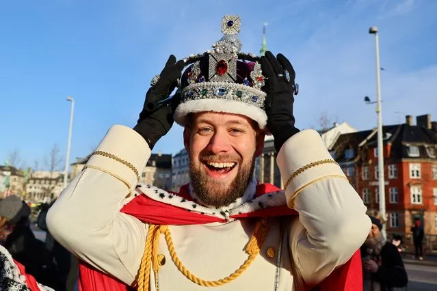 Rene Jensen reacts on the day Danish Queen Margrethe II, Europe's longest-serving monarch, abdicates after 52 years on the throne, and her elder son, Crown Prince Frederik, ascends the throne as King Frederik X, in Copenhagen, Denmark, on January 14, 2024. (Photo by Wolfgang Rattay/Reuters)