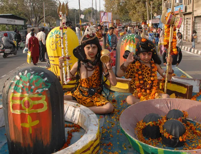 Hindu devotees dressed as Lord Shiva take part in a religious procession ahead of “Maha Shivratri” festival in Jammu February 21, 2009. (Photo by Amit Gupta/Reuters)