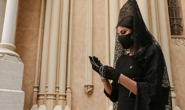 Mantilla women attend the Holy Offices of Good Friday on the occasion of Holy Week in Malaga, Spain on April 2, 2021. (Photo by Lorenzo Carnero/ZUMA Wire/Rex Features/Shutterstock)