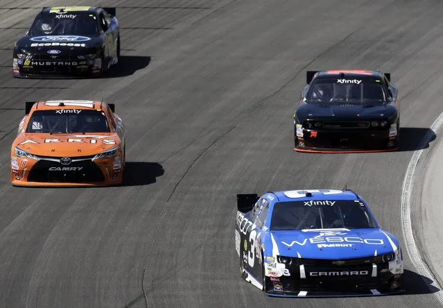 Ty Dillon (3) leads during the NASCAR Xfinity series auto race at Chicagoland Speedway, Sunday, June 21, 2015, in Joliet, Ill. (AP Photo/Nam Y. Huh) 
