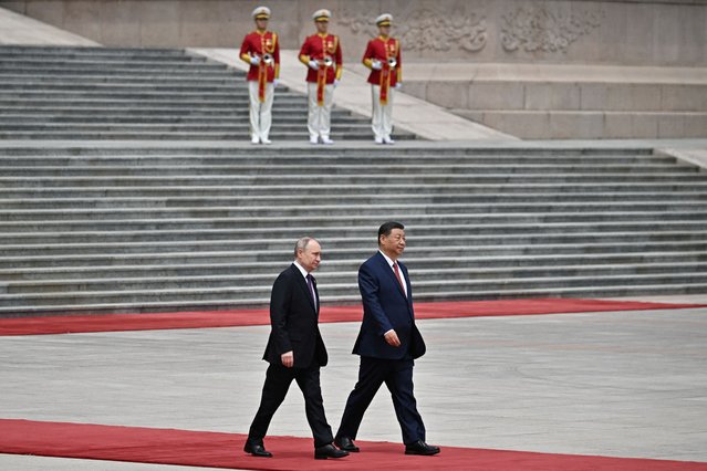 Russian President Vladimir Putin and Chinese President Xi Jinping attend an official welcoming ceremony in Beijing, China on May 16, 2024. (Photo by Sergei Bobylev/Sputnik/Pool via Reuters)