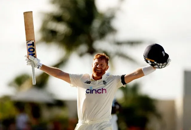 England's Jonny Bairstow celebrates his century during West Indies v England first test match at Sir Vivian Richards Stadium, Antigua, Antigua and Barbuda on March 8, 2022. (Photo by Jason Cairnduff/Action Images via Reuters)