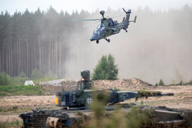 Eurocopter Tiger of the German Army takes part in the Lithuanian-German division-level international military exercise “Grand Quadriga 2024” at a training range in Pabrade, north of the capital Vilnius, Lithuania on Wednesday, May 29, 2024. “Grand Quadriga 2024”, a wide-scale exercise of the German Bundeswehr that rehearses moving two divisions from the central part of Europe to eastern. Over 3 thousand German troops and military equipment has been moved to Lithuania.(Photo by Mindaugas Kulbis/AP Photo)