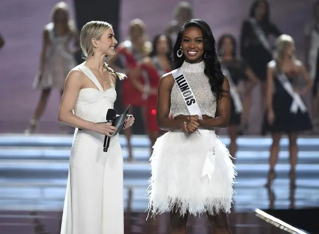 Show host Julianne Hough interviews  Miss Illinois Whitney Wandland during the 2017 Miss USA pageant at the Mandalay Bay Events Center on May 14, 2017 in Las Vegas, Nevada. (Photo by David Becker/Reuters)