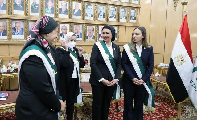 Egyptian female judges pose at the State Council headquarters in Giza, Egypt, 06 March 2022. Egypt’s president Abdel-Fattah El-Sisi has announced in June that women can work at the State Council and the Public Prosecution for the first time in the country’s history starting 01 October. A landmark presidential decree has been issued on 04 October declaring 48 women from the State Lawsuits Authority and the Administrative Prosecution and 50 women from the State Lawsuits Authority and the Administrative Prosecution will begin their work as assistant counselors and deputies at the State Council respectively. In spite of the fact that there are a number of women working in judicial positions, no woman has ever been appointed as a judge at the State Council and the Public Prosecution before. (Photo by Khaled Elfiqi/EPA/EFE)
