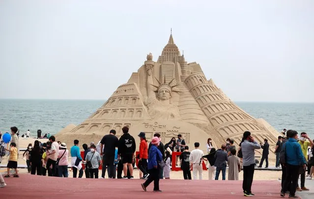 The annual sand festival, featuring sand sculptures, opens at Haeundae Beach in Busan, South Korea, 20 May 2022. (Photo by Yonhap/EPA/EFE)