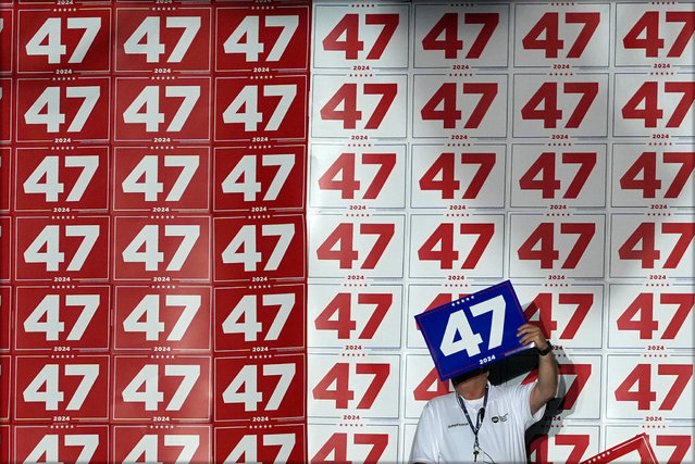 A supporter watches as Republican presidential nominee former President Donald Trump speaks during a campaign rally at Greensboro Coliseum, Tuesday, October 22, 2024, in Greensboro, N.C. (Photo by Julia Demaree Nikhinson/AP Photo)