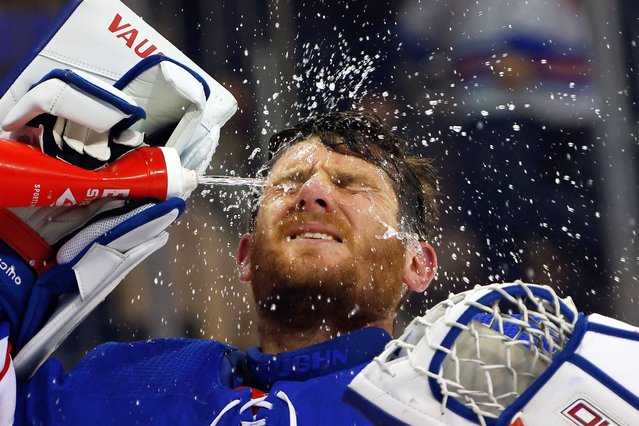 Jonathan Quick #32 of the New York Rangers takes a third period water break during the game against the Nashville Predators at Madison Square Garden on October 19, 2023 in New York City. The Predators defeated the Rangers 4-1. (Photo by Bruce Bennett/Getty Images/AFP Photo)