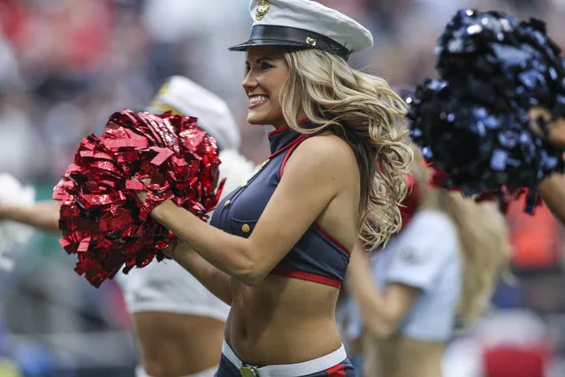 November 17, 2013; Houston, TX, USA; A Houston Texans cheerleader performs during a game against the Oakland Raiders at Reliant Stadium. (Photo by Troy Taormina/USA TODAY Sports)
