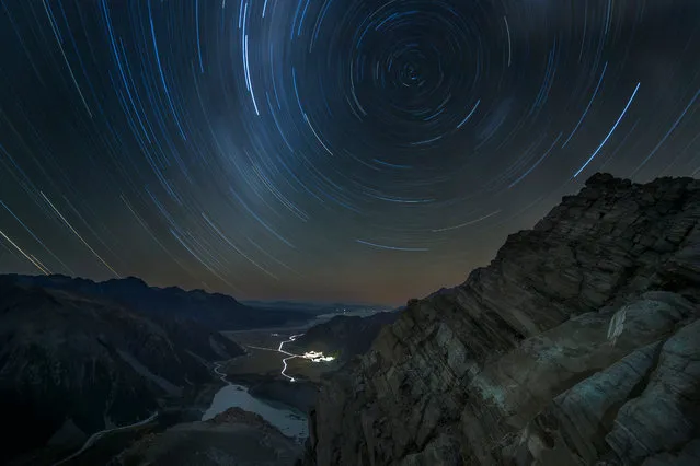 “Above the World”. Taken from Sefton Bivouac, the oldest hut in Mount Cook National Park, New Zealand, star trails spiral over the majestic mountains of the park and the seemingly peaceful village below. (Photo by Lee Cook/Royal Observatory Greenwich’s Astronomy Photographer of the Year 2016/National Maritime Museum)