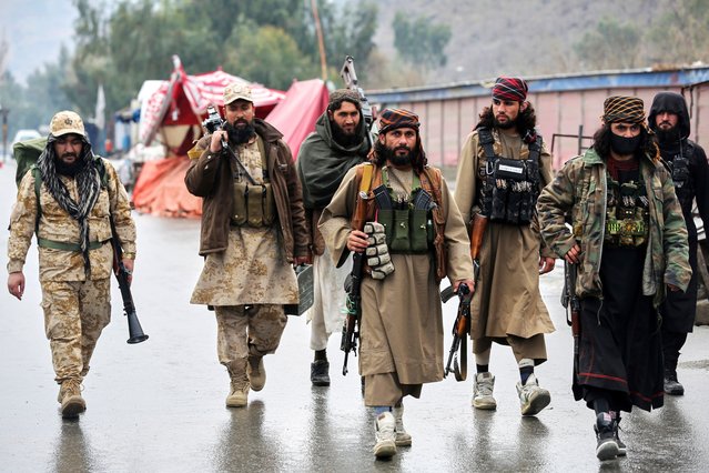 Taliban fighters patrol near the closed Torkham border with Pakistan, where Pakistani and Afghan forces exchanged fire overnight, in Torkham, Afghanistan, Monday, March 3, 2025. (Photo by Shafiullah Kakar/AP Photo)