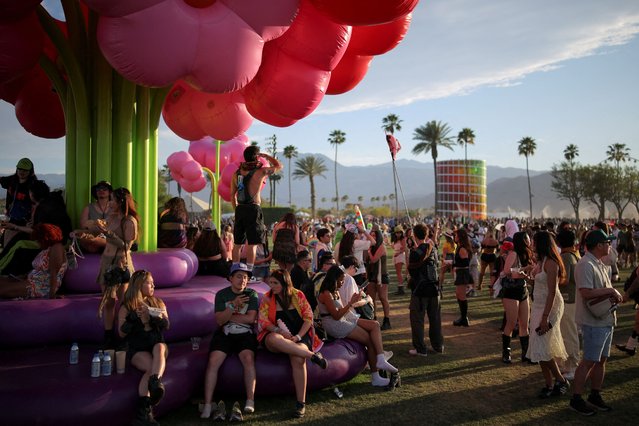People attend the Coachella Valley Music and Arts Festival in Indio, California, U.S., April 12, 2025. (Photo by Daniel Cole/Reuters)