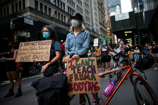 People take part in a march and rally during the National Day of Resistance to schools re-opening amid the outbreak of the coronavirus disease (COVID-19), in New York City, U.S., August 3, 2020. (Photo by Eduardo Munoz/Reuters)