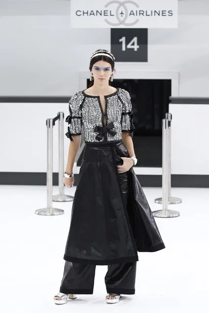 Model Kendall Jenner presents a creation by German designer Karl Lagerfeld as part of his Spring/Summer 2016 women's ready-to-wear collection for fashion house Chanel at the Grand Palais which is transformed into a Chanel airport during Fashion Week in Paris, France, October 6, 2015. (Photo by Benoit Tessier/Reuters)