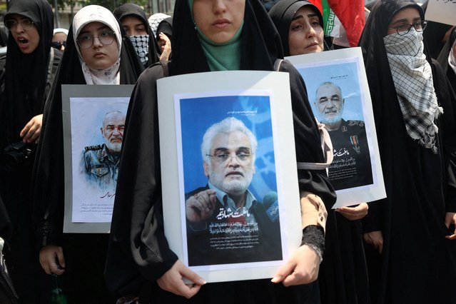 People attend an anti-Israeli protest following the Israeli strikes on Iran, in Tehran, Iran, on June 13, 2025. (Photo by Majid Asgaripour/WANA News Agency via Reuters)