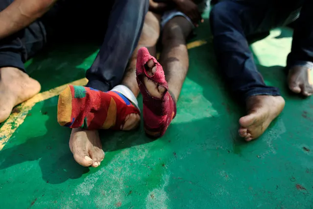 Migrants are seen onboard of Iuventa vessel after they were rescued from an overcrowded dinghy by members of the German NGO Jugend Rettet during an operation, off the Libyan coast in the Mediterranean Sea September 21, 2016. (Photo by Zohra Bensemra/Reuters)