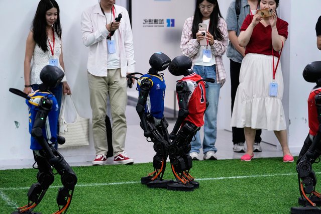 K1 robots from Booster Robotics operate before leaving for the Brazil Robocup at a pre-competition exploration camp in Beijing, Wednesday, July 9, 2025. (Photo by Mahesh Kumar A./AP Photo)