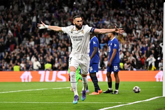 Real Madrid's French forward Karim Benzema celebrates scoring his team's first goal during the UEFA Champions League quarter final first leg football match between Real Madrid CF and Chelsea FC at the Santiago Bernabeu stadium in Madrid on April 12, 2023. (Photo by Javier Soriano/AFP Photo)
