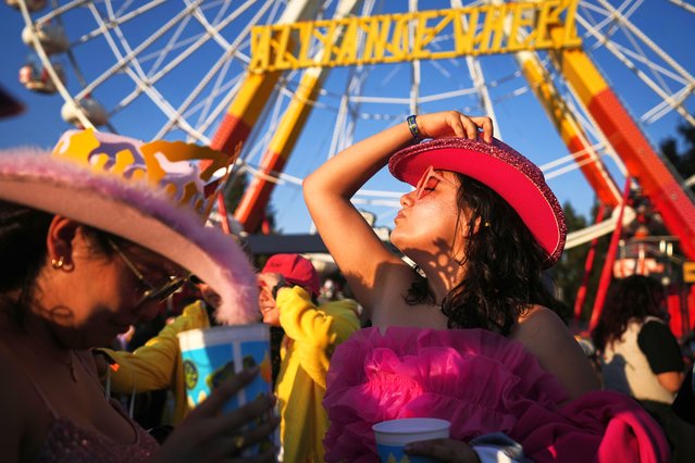 A woman dons a Chappell Roan-inspired hat during the Corona Capital music festival in Mexico City, November 15, 2025. (Pgoro by Claudia Rosel/AP Photo)