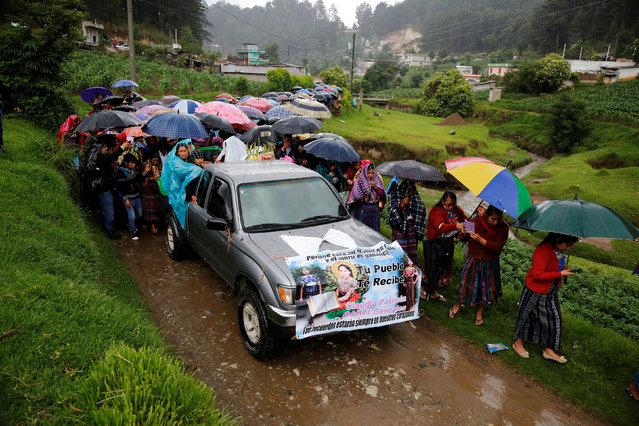 Relatives and friends of Claudia Gomez, a 19-year old Guatemalan immigrant who was shot by a U.S. Border Patrol officer, take part in her funeral procession towards a cemetery in San Juan Ostuncalco, Guatemala June 2, 2018. (Photo by Luis Echeverria/Reuters)