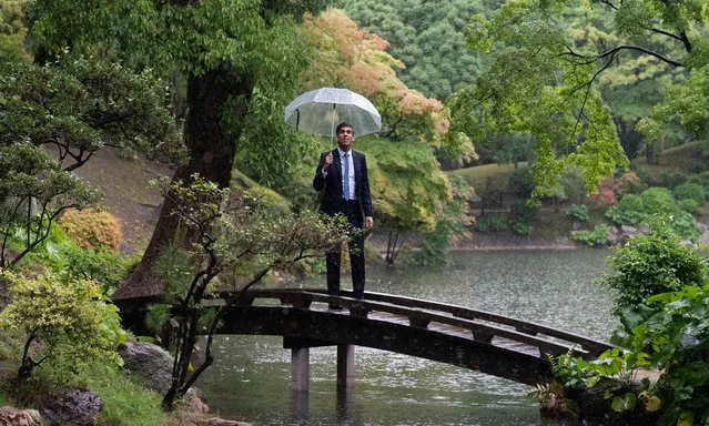 Britain's Prime Minister Rishi Sunak visits Shukkeien Garden before attending the G7 Leaders' Summit in Hiroshima on May 19, 2023. (Photo by Stefan Rousseau/Pool via AFP Photo)