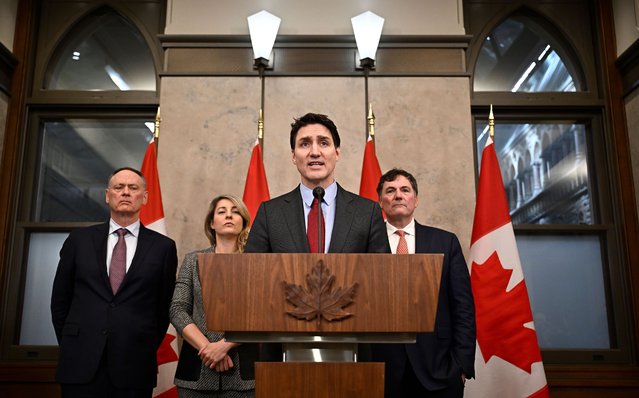 Prime Minister Justin Trudeau addresses media following the imposition of a raft of tariffs by U.S. President Donald Trump against Canada, Mexico and China, in Ottawa, Saturday, February 1, 2025. Minister of Public Safety David McGuinty, left to right, Global Affairs Minister Melanie Joly and Minister of Governmental Affairs Dominic LeBlanc look on. (Photo by Canadian Press/Rex Features/Shutterstock)