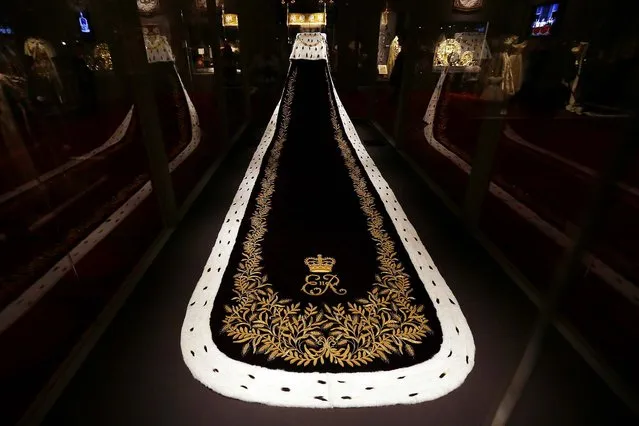 The Coronation Robe of Queen Elizabeth is seen during a media preview of the exhibition “The Queen's Coronation 1953” at Buckingham Palace, on July 25, 2013. (Photo by Stefan Wermuth/Reuters)