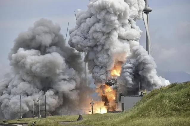 Smoke rises as an engine for an Epsilon S rocket exploded during a test at the Japan Aerospace Exploration Agency's testing site in Noshiro, Akita Prefecture, northeastern Japan, Friday,  July 14, 2023. (Photo by Kyodo News via AP Photo)