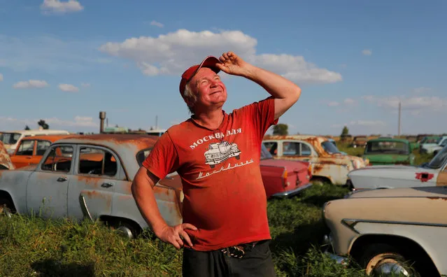 Former auto racer and retro car collector, Krasinets looks on at an open-air museum of Soviet-made vehicles in the village of Chernousovo, Tula region, Russia on September 27, 2018. (Photo by Maxim Shemetov/Reuters)