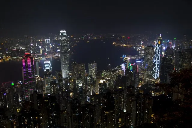 Commercial towers light up by Power Assets, which provides electricity to Hong Kong island, are seen from the Peak in Hong Kong, China September 8, 2015. (Photo by Tyrone Siu/Reuters)