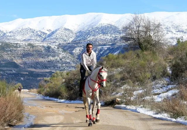 A man rides a horse in Mokhtara village in Mount Lebanon January 29, 2017. (Photo by Jamal Saidi/Reuters)